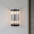 Modern black and gold crystal rod cylinder wall sconce featuring vertical clear glass tubes framed by black metal rings