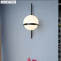 Modern black and gold wall sconce with frosted glass shade and spherical design for bedroom e26 e27 light type