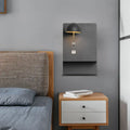 Modern metal wall light in black and gold with usb port designed for living room use with metal wall mounting