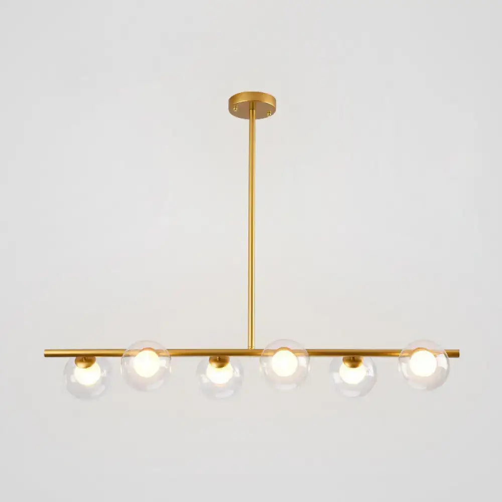Modern black island pendant with clear glass globes dining room