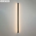 Modern black linear flush mount wall sconce with slim metallic frame and warm ambient glow for hallway lighting