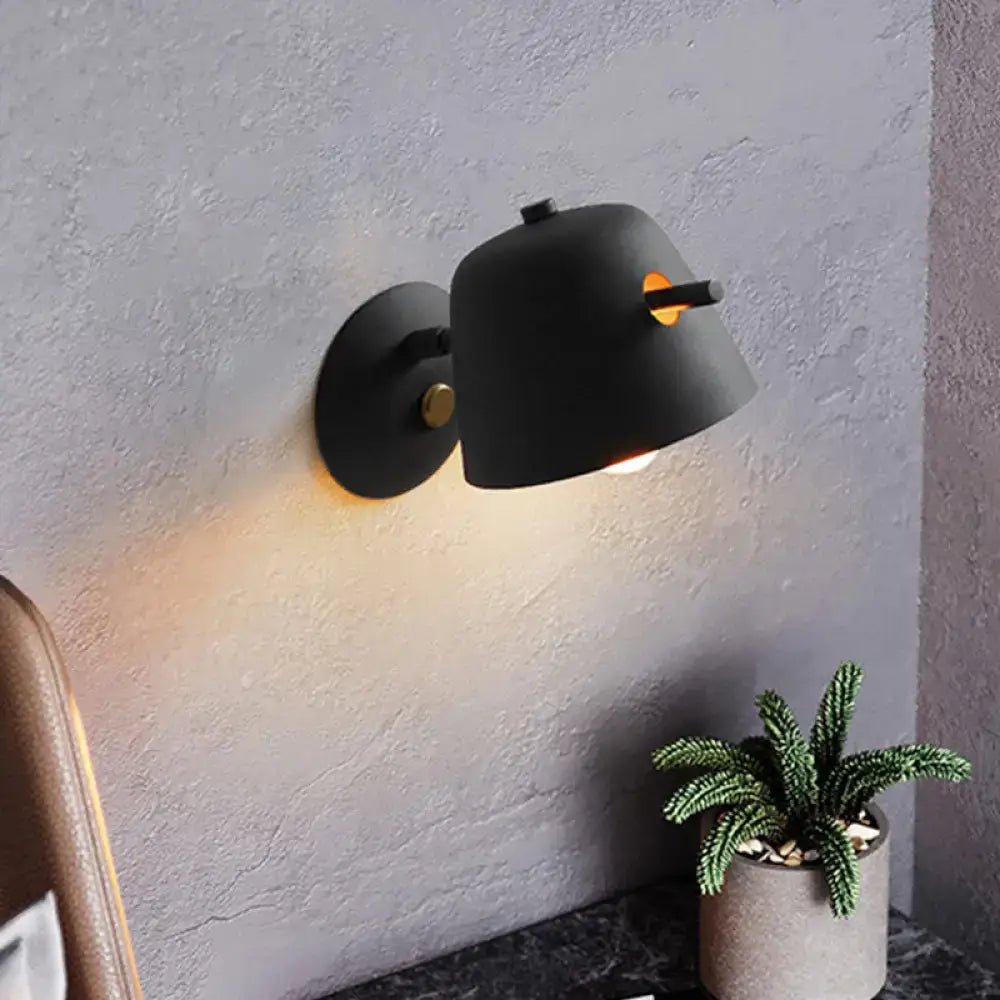 Modern black metal shade wall sconce with white & blue bedroom light