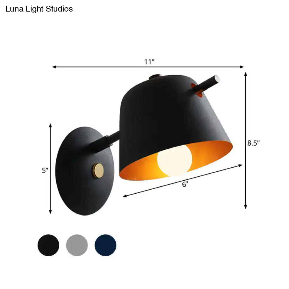 Modern black metal shade wall sconce with white & blue bedroom light