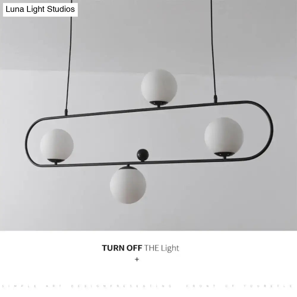 Modern black minimalist ellipse ceiling light with white globes living room