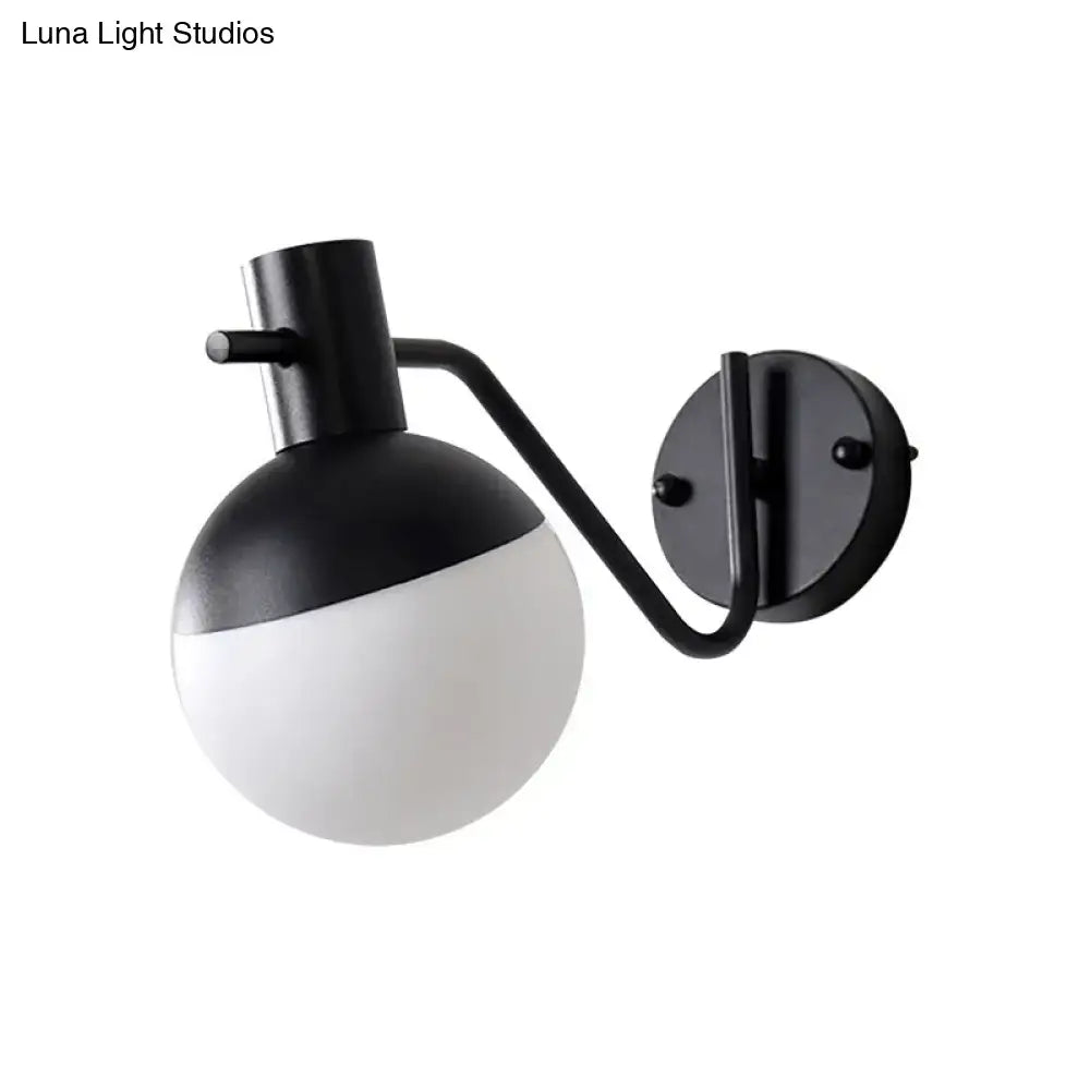 Modern black sconce light with milk glass shade living room