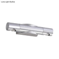 Silver metallic wall-mounted light fixture with two cylindrical arms and warm white lighting for living room use