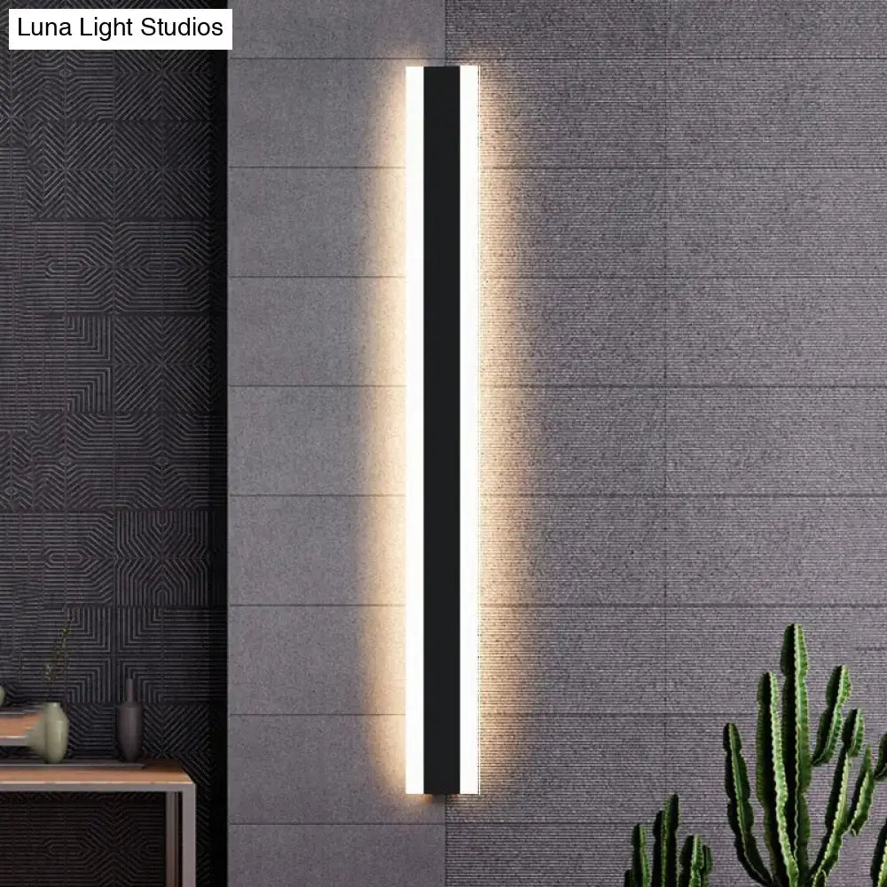 Modern black vertical led wall sconce with sleek minimalist design and warm ambient lighting ip65 waterproof for living room