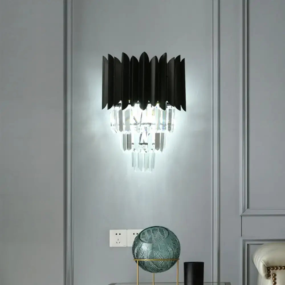 Modern black wall sconce with clear crystal prisms bedroom light