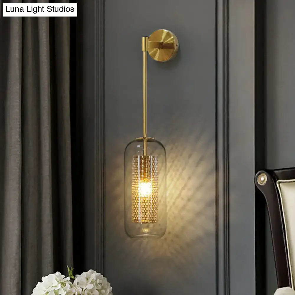 Modern black wall sconce with clear glass and wire mesh stairway light