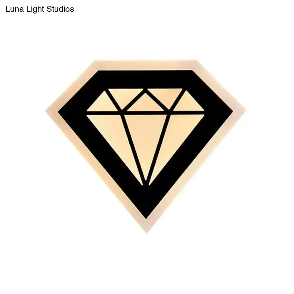 Stylized acrylic diamond bedside wall lamp with black outline and cream geometric facets light fixture for bedroom