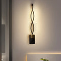 Modern black and white musical note wall lamp with acrylic shade and sleek twisted wall sconce design with warm led lighting