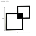 Modern black wall sconce with two overlapping 17 inch acrylic shade squares for dining room decor