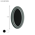 Modern black and white rotatable led wall light fixture with a sleek double-rimmed oval mirror for bedroom wall light