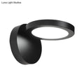 Modern black circular wall light fixture with sleek rotating design for bedroom glow and contemporary ambiance