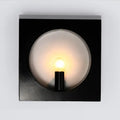 Modern black and white square wall lamp with frosted glass globe and medium base exposed bulb in a inches fixture