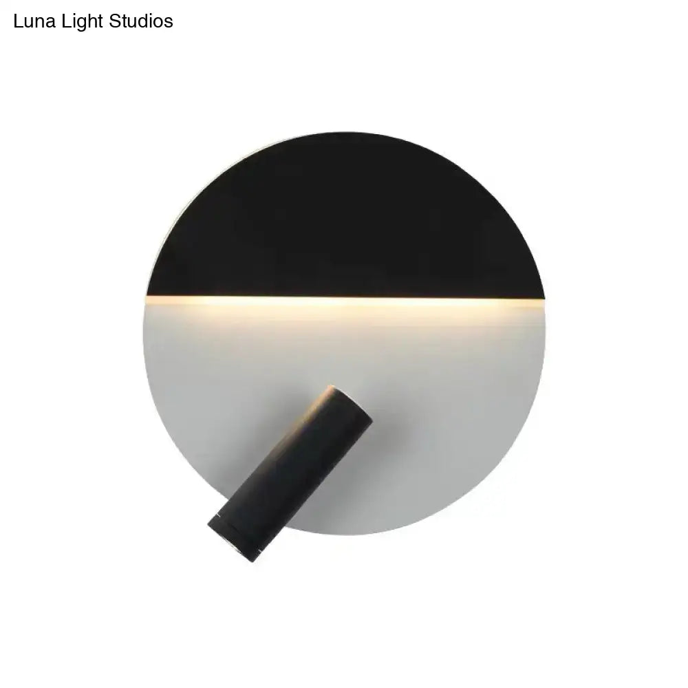 Modern black & white wall sconce with adjustable spotlight – bedroom