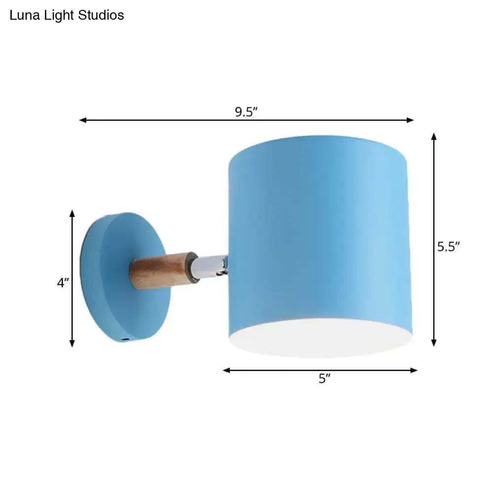 Modern blue metal tubular wall lamp with wood arm bedroom sconce light