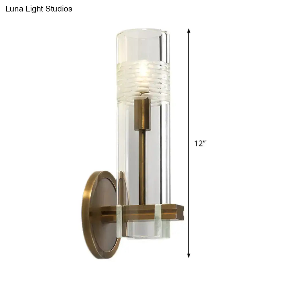 Modern brass and clear glass metal arm sconce bedroom wall light