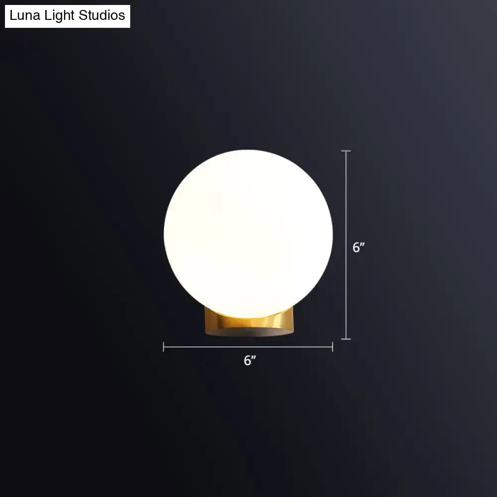Modern brass and opal glass wall mount lamp bedside bedroom sconce