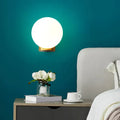 Modern brass and opal glass wall mount lamp bedside bedroom sconce