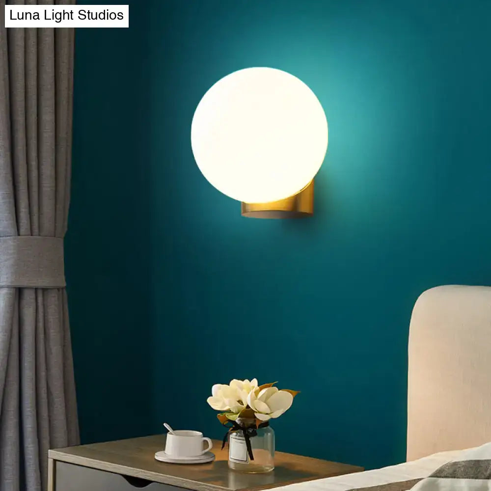 Modern brass and opal glass wall mount lamp bedside bedroom sconce