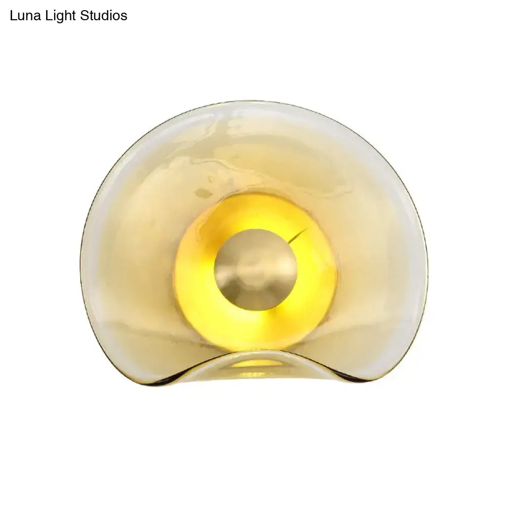 Modern brass and tan glass wall light fixture bedroom sconce