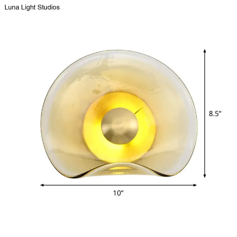Modern brass and tan glass wall light fixture bedroom sconce