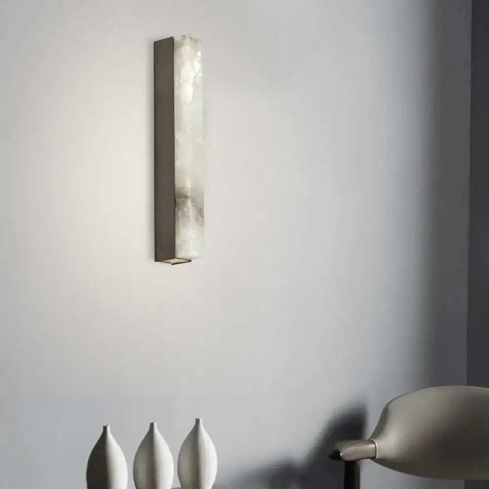 Modern brass and white onyx wall lighting – living room sconce