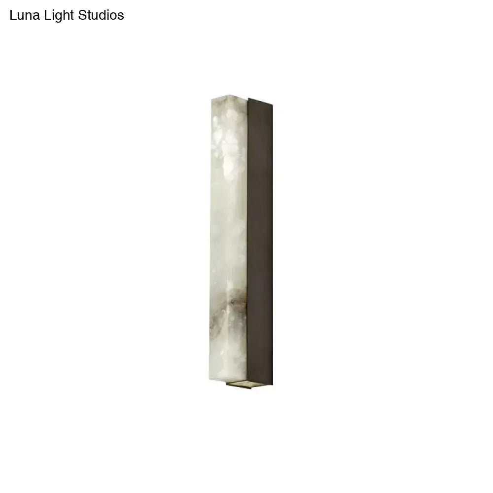 Modern brass and white onyx wall lighting – living room sconce