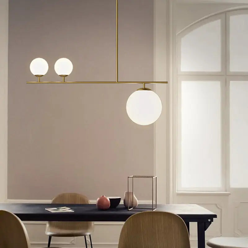Modern brass ball pendant light opal glass island dining room
