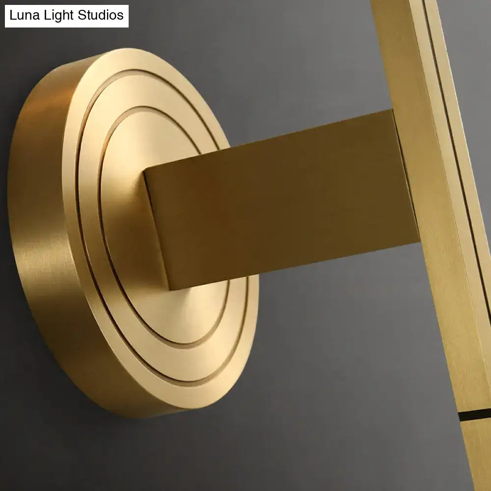 Modern brass diamond wall light with lattice glass shade bedroom