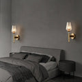 Modern brass diamond wall light with lattice glass shade bedroom