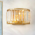 Modern brass drum shaped wall sconce with gold finish vertical crystal prisms and clear crystals for e12 e14 bulb use