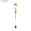 Modern brass l-shaped wall sconce with pull chain for living room