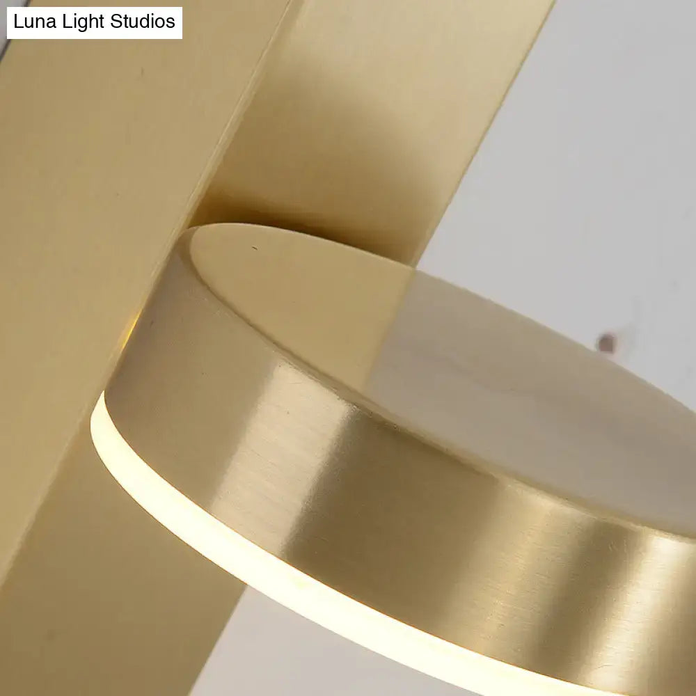 Modern brass l-shaped wall sconce with pull chain for living room