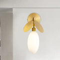 Modern brass leaf wall lamp with cream glass globe and gold-toned metal fins for 220v-240v 110v-120v bedroom sconce