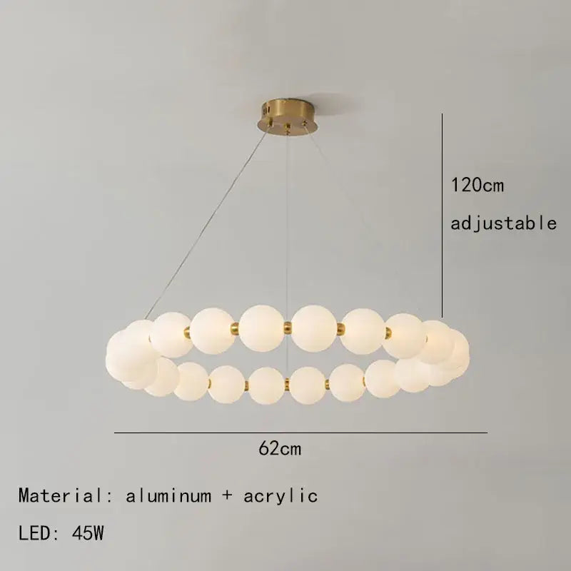 Modern brass led pendant light with frosted spheres for living room