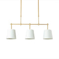 Modern brass pendant light with white green flaxen shades dining room