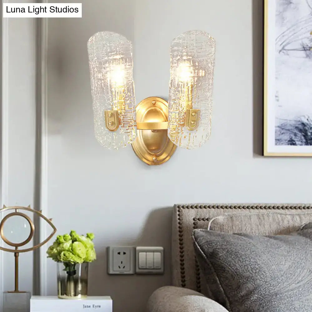 Modern brass sconce with clear water glass for living room two lights