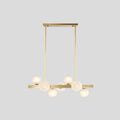 Modern brass simplicity globe pendant dining room light with six frosted glass bulbs in a linear arrangement