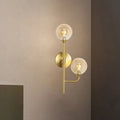 Modern brass sphere wall sconce amber & smoke gray bathroom light