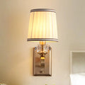 Modern brass wall lamp – bedroom sconce with pleated shade