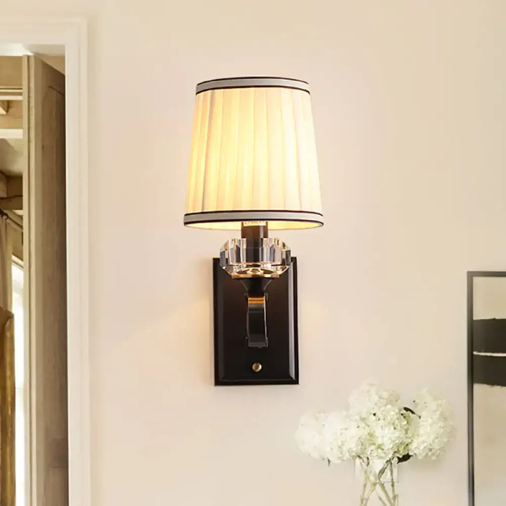 Modern brass wall lamp – bedroom sconce with pleated shade