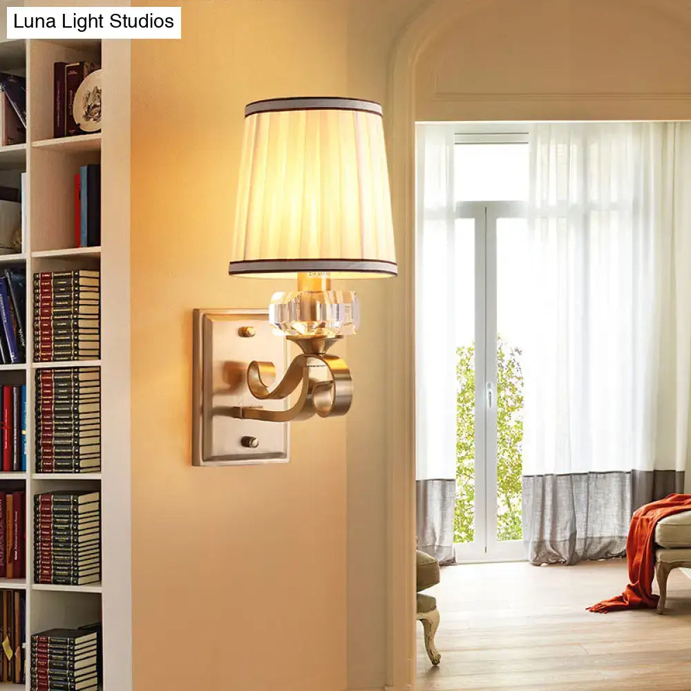 Modern brass wall lamp – bedroom sconce with pleated shade