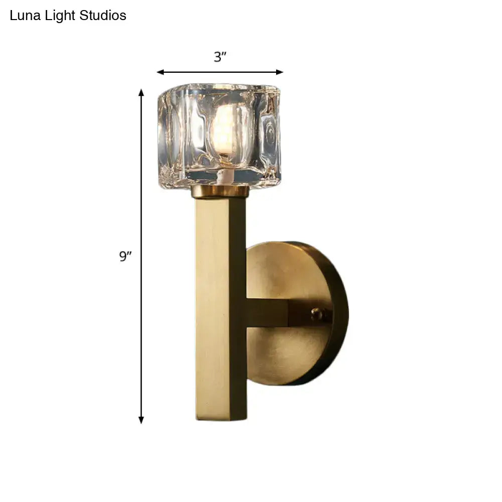 Modern brass wall light with clear crystal block for living room