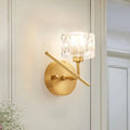Modern brass wall light with clear crystal shade – bedroom sconce