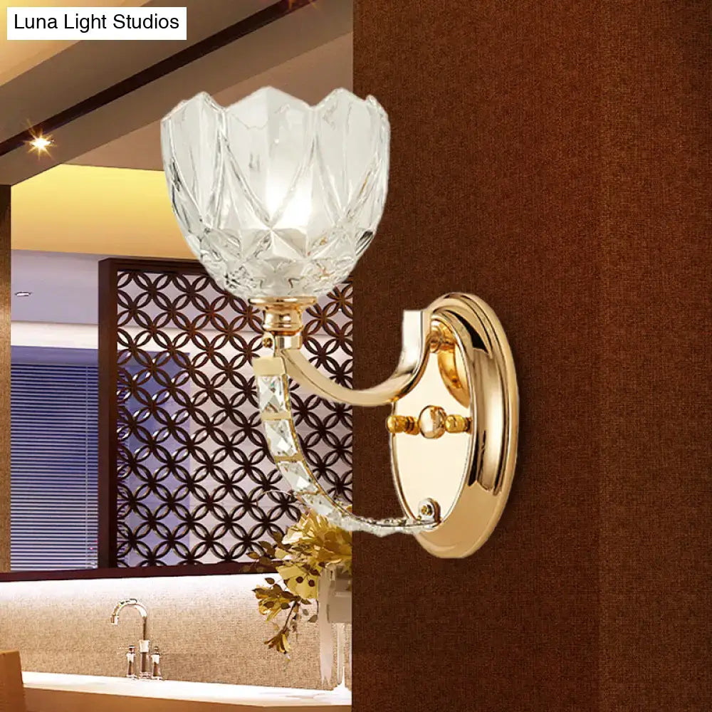 Modern brass wall sconce bedroom light with faceted clear glass shade