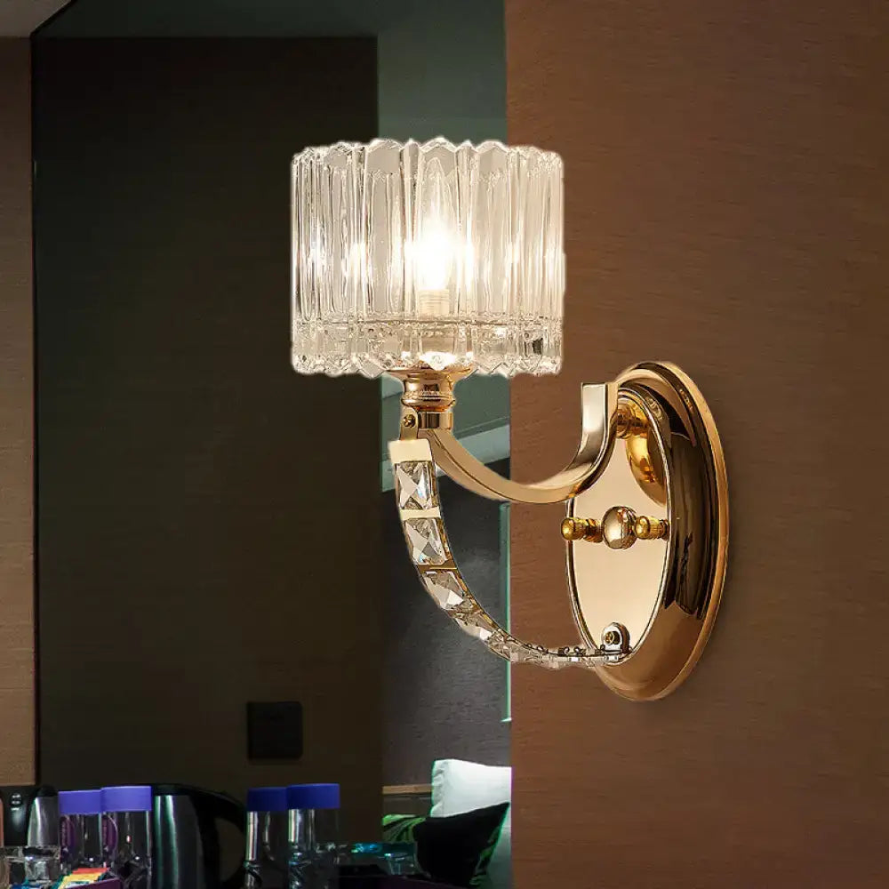 Modern brass wall sconce bedroom light with faceted clear glass shade