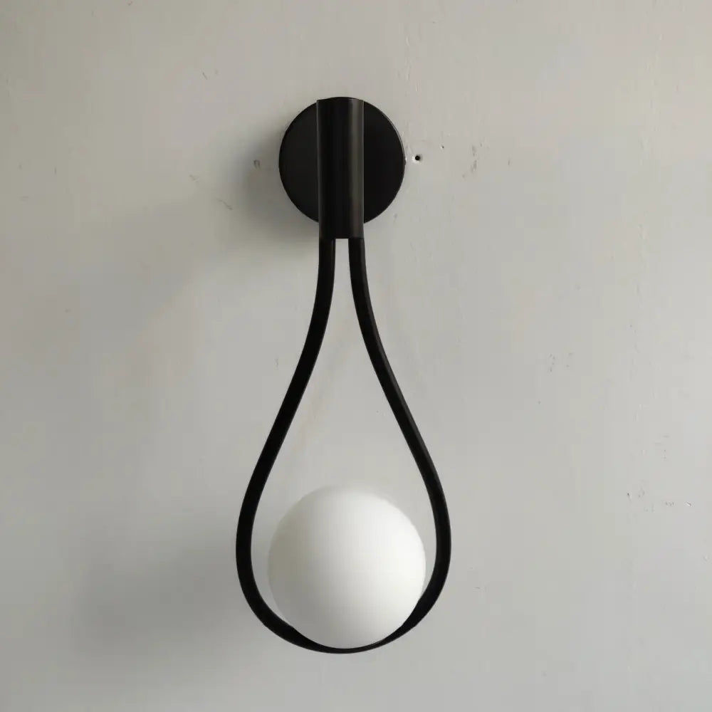 Modern brass wall sconce frosted glass teardrop living room light
