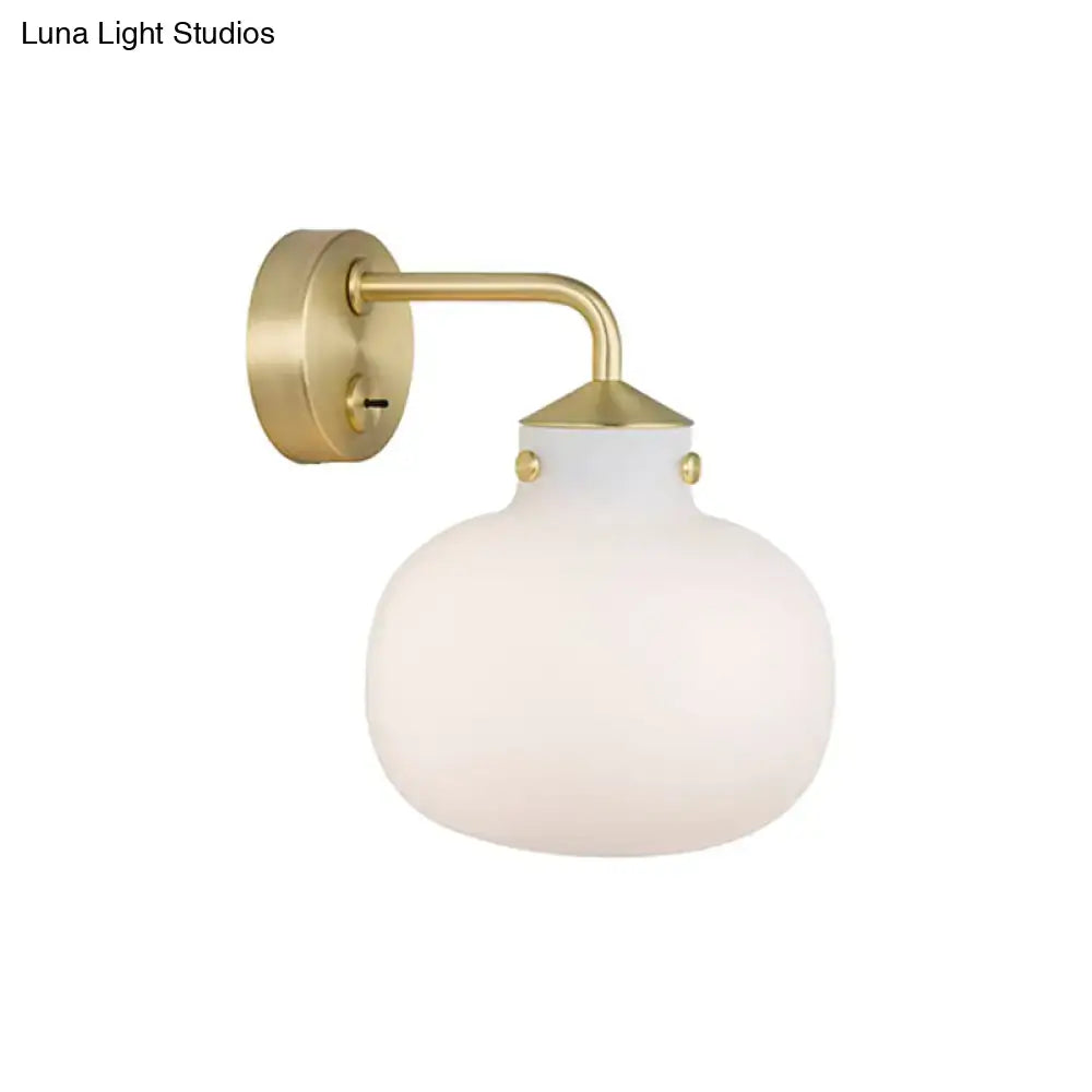 Modern brass wall sconce with oblong milk white glass shade balcony light